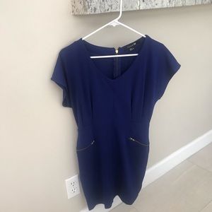 Mid length dress with gold statement zippers